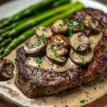 Ribeye Steak with Creamy Mushroom Sauce and Asparagus